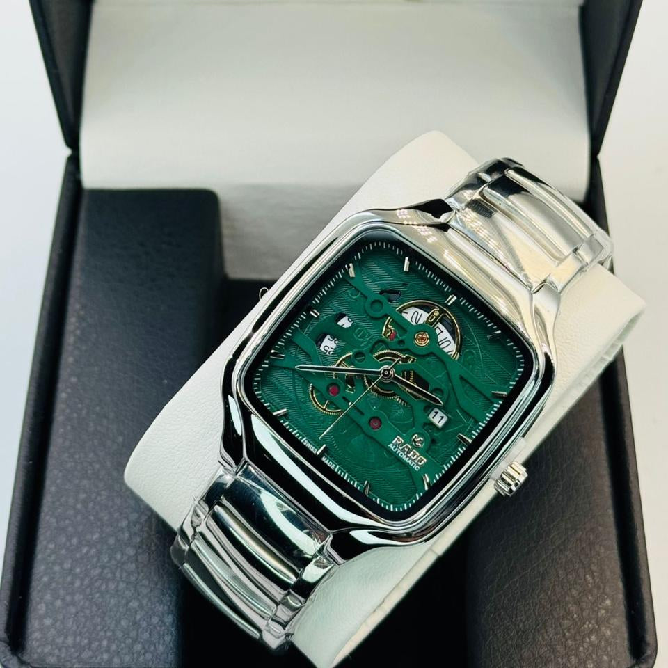 Rado watch with green face and silver band in a box
