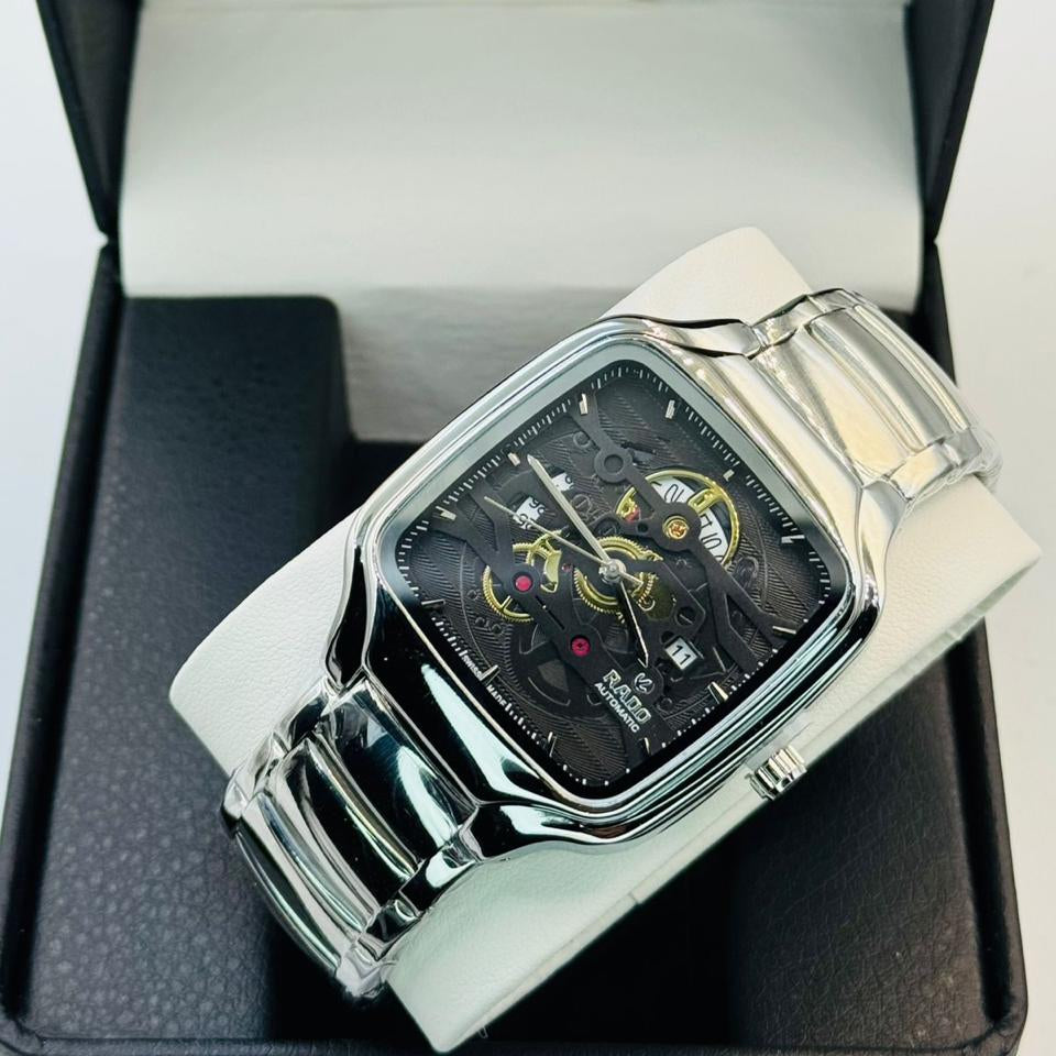 Silver watch with black face in a Rado box