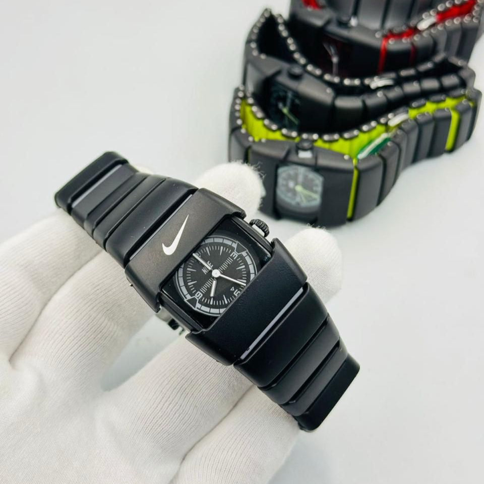 Black Nike watch on a white background