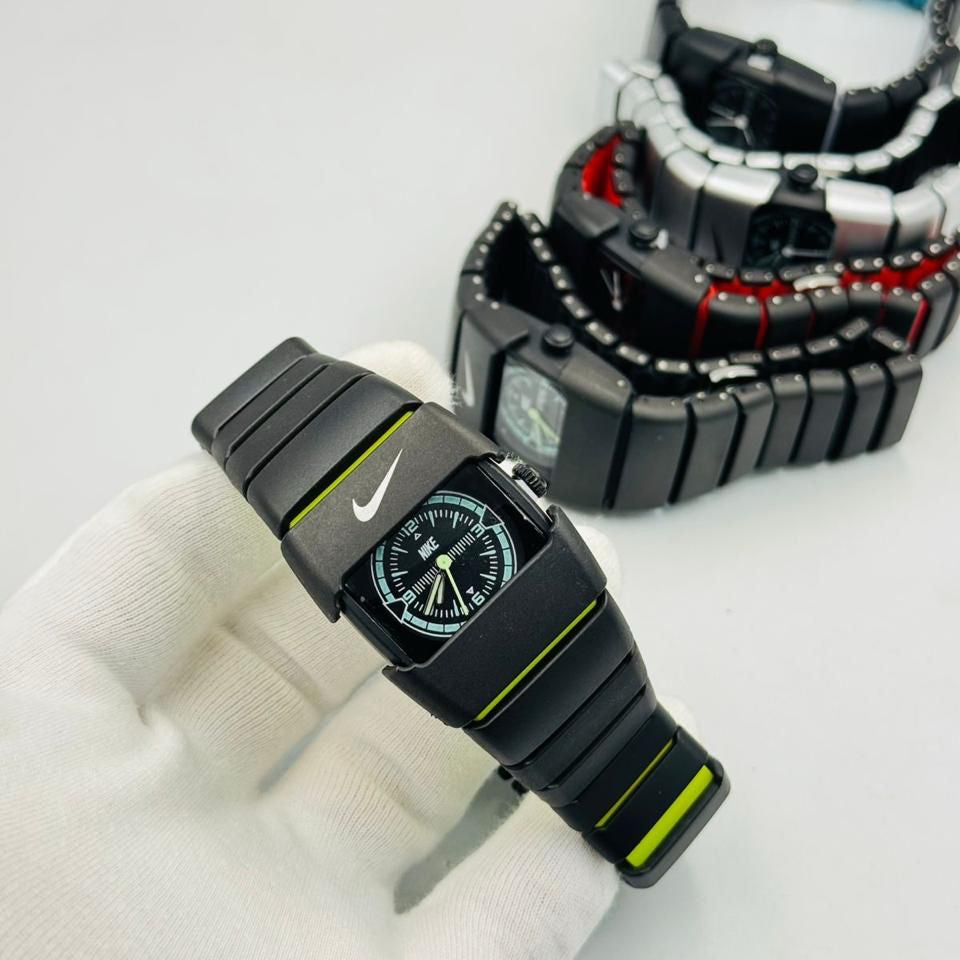 Black Nike watch with a unique band design on a white background